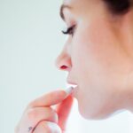 portrait-of-a-woman-taking-a-pill-royalty-free-image-1741860468.pjpeg_.jpeg